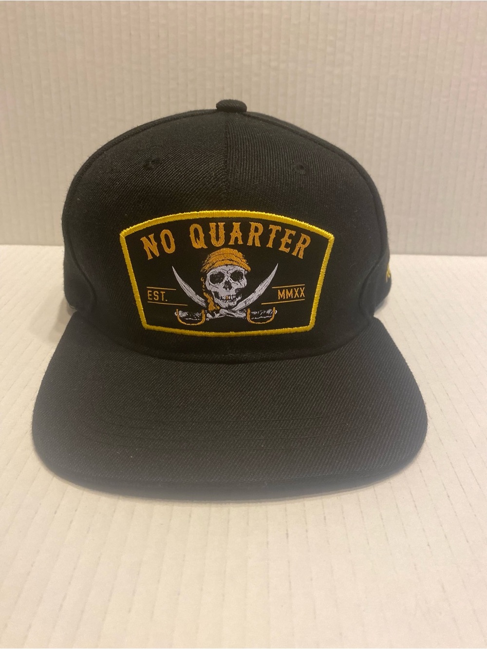 No Quarter Black & Gold Skull Patch Snapback Hat